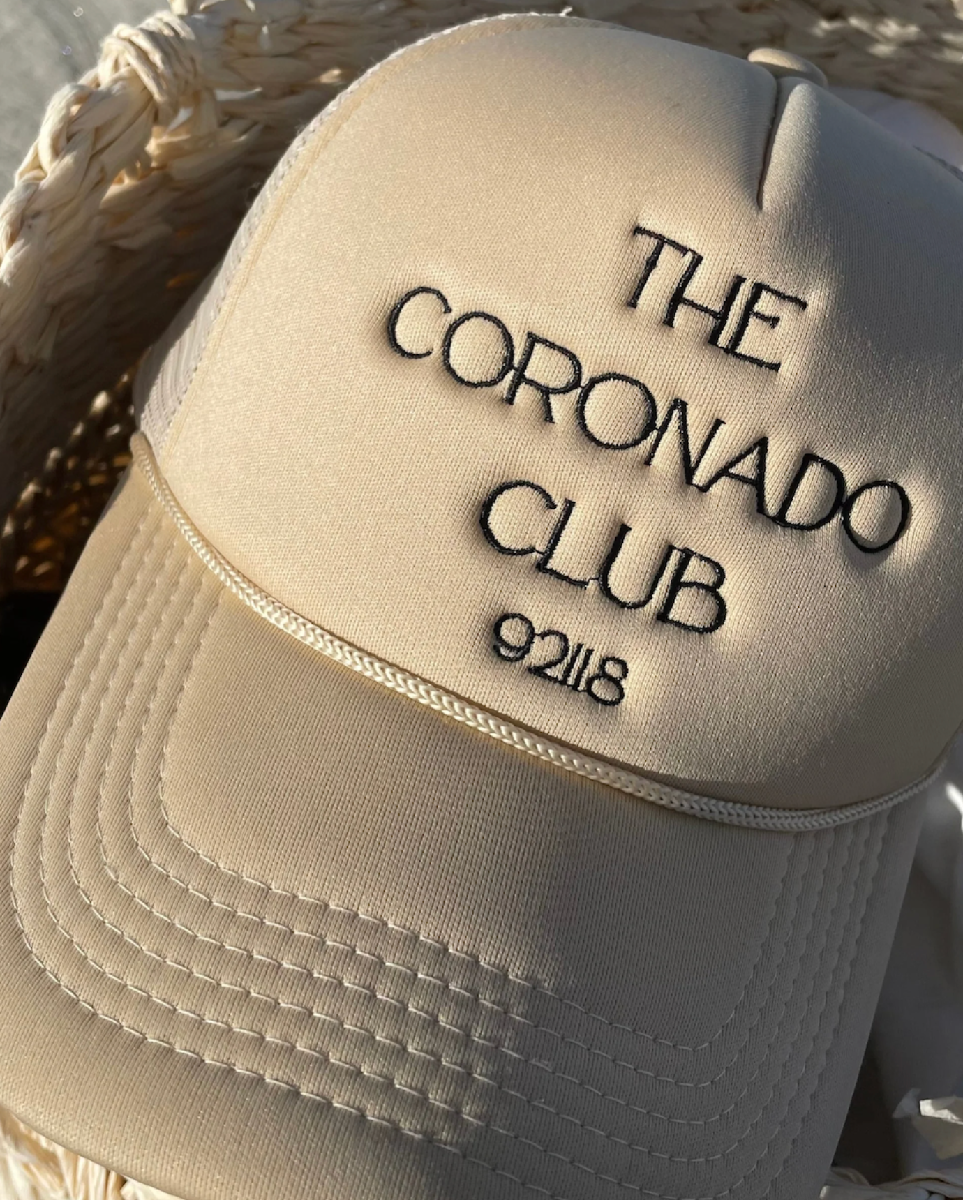 the coronado club trucker hat