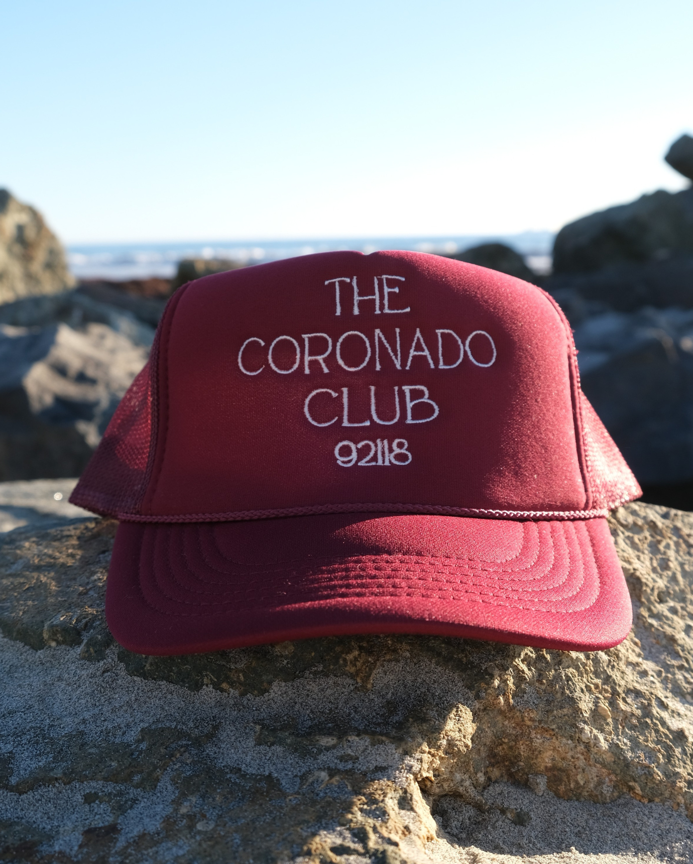 the coronado club® trucker hat - cranberry